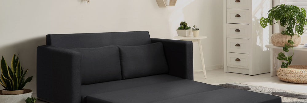 Sala de estar com sofá-cama vira na cor grafite