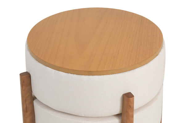 foto do puff mesa de centro macaron na cor amêndoa e tecido bege focando no tampo em fundo branco