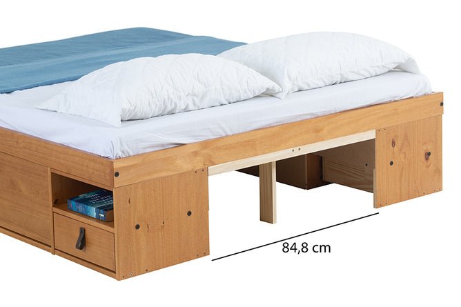 foto da cama queen size com gavetas bali na cor nozes em fundo branco decorada detalhe cabeceira