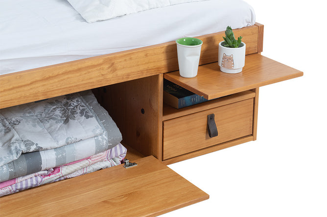 foto da cama queen size com gavetas bali na cor nozes em fundo branco decorada detalhe mesa de cabeceira