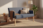 sofa arpoador cinza escuro ambientado na sala de estar