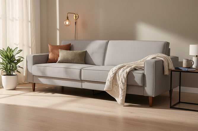 sofa nairobi cinza claro ambientado na sala de estar